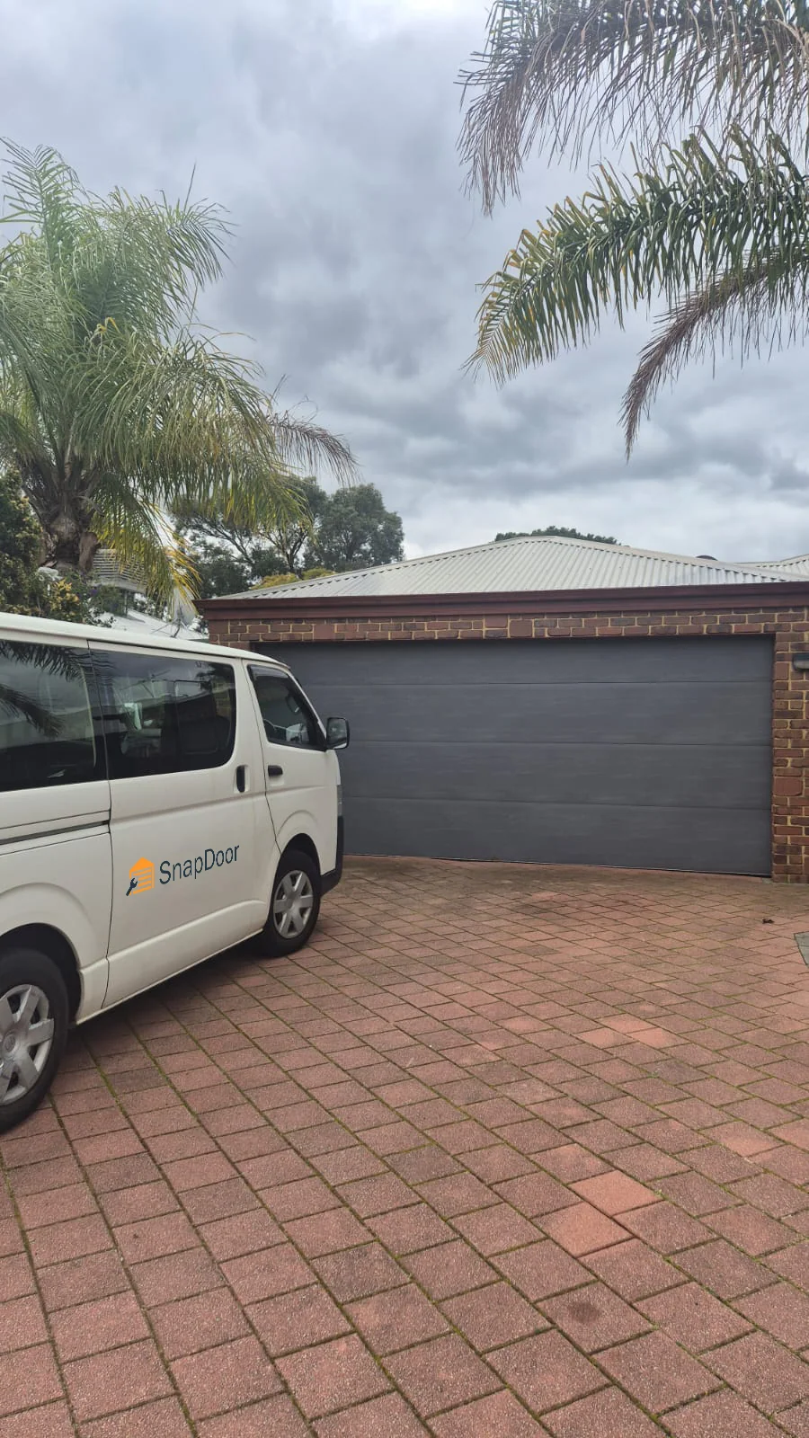 SnapDoor van parked outside a Perth home