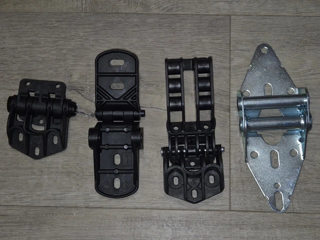 Steel and reinforced plastic garage door hinges