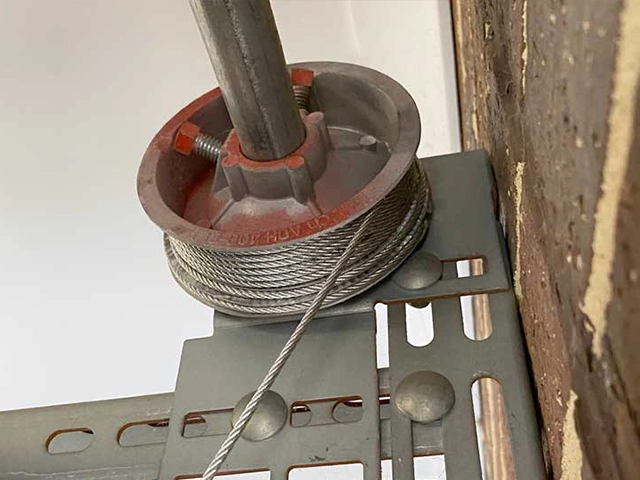 New garage door lifting cable fitted to the drum