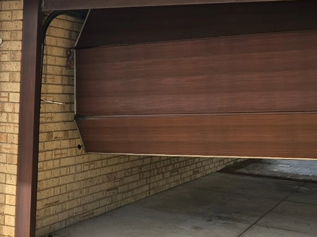 Garage door sitting out of alignment